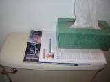 magazines on toilet tank